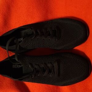 Black Berness Sneakers. They have never been worn. They are breathable; a size 8